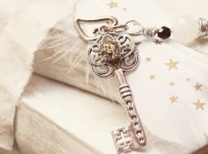 key, heart, feather